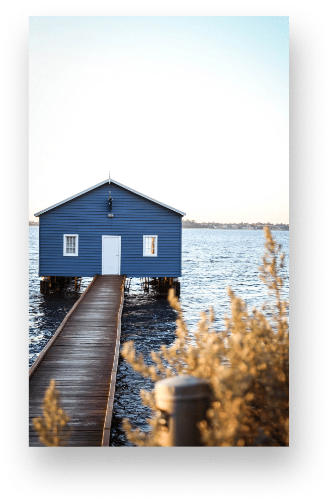 Iconic blue house on the Perth pier, symbolising unique waterfront property opportunities in Perth.